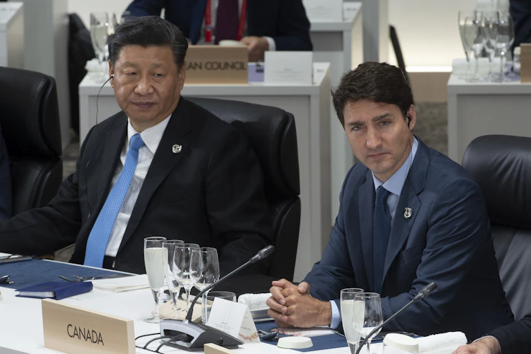 Le Premier ministre canadien Justin Trudeau et le président chinois Xi Jinping