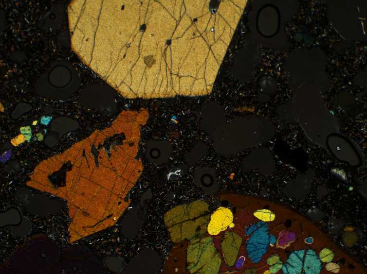 Microscopic image of crystals in magma.