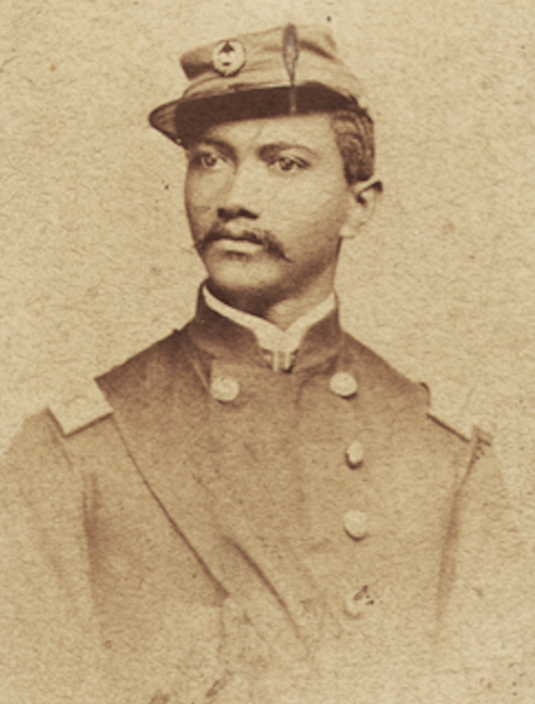 Old portait image of a Black man who served during the American Civil War.