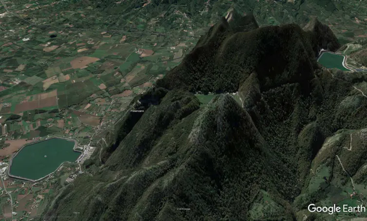 Google Earth synthetic image of a Gigawatt-rated off-river PHES site at Presenzano in Italy, showing the two reservoirs (upper right and lower left)