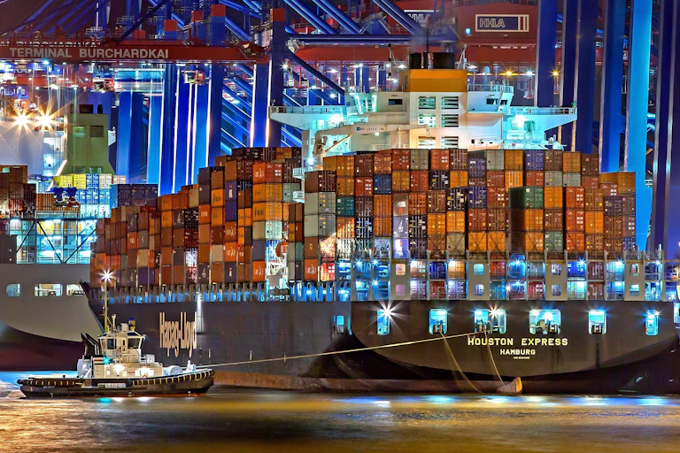 A ship loaded with containers in port