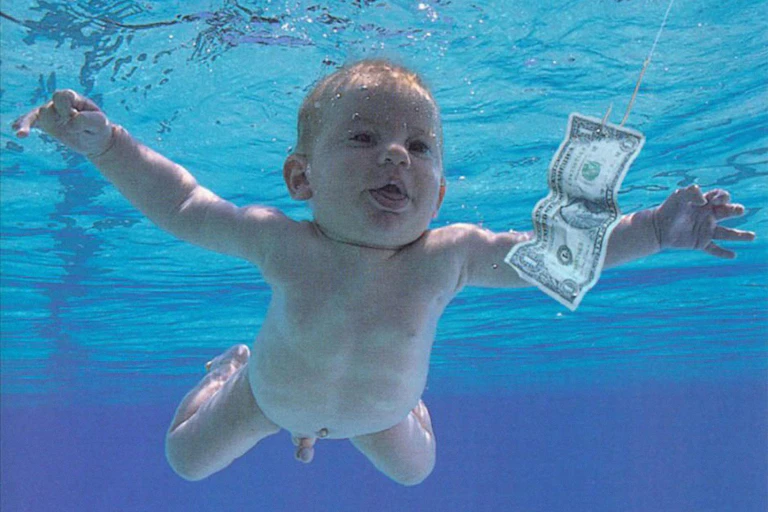 Nirvana nevermind albulm cover, baby ion swimming pool chasing a dollar