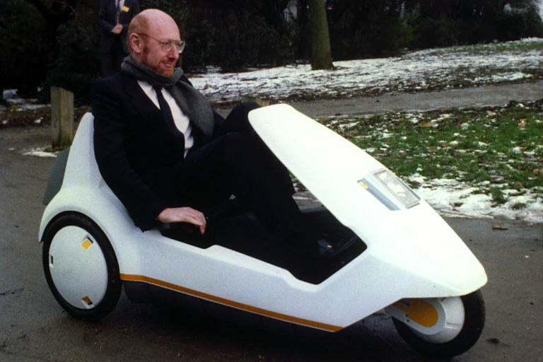 Clive Sinclair in his C5 electric car