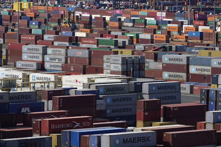 Hundreds of shipping containers are stacked in the Port of New York and New Jersey in Elizabeth, N.J.,
