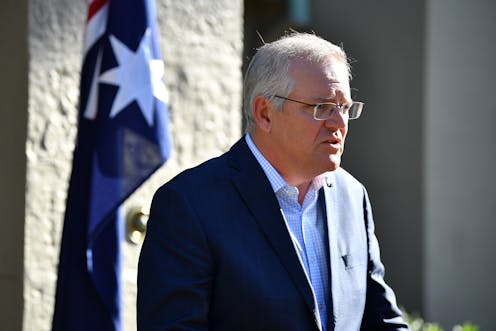 Coalition gains a point in Newspoll, but Morrison slides back into net negative ratings