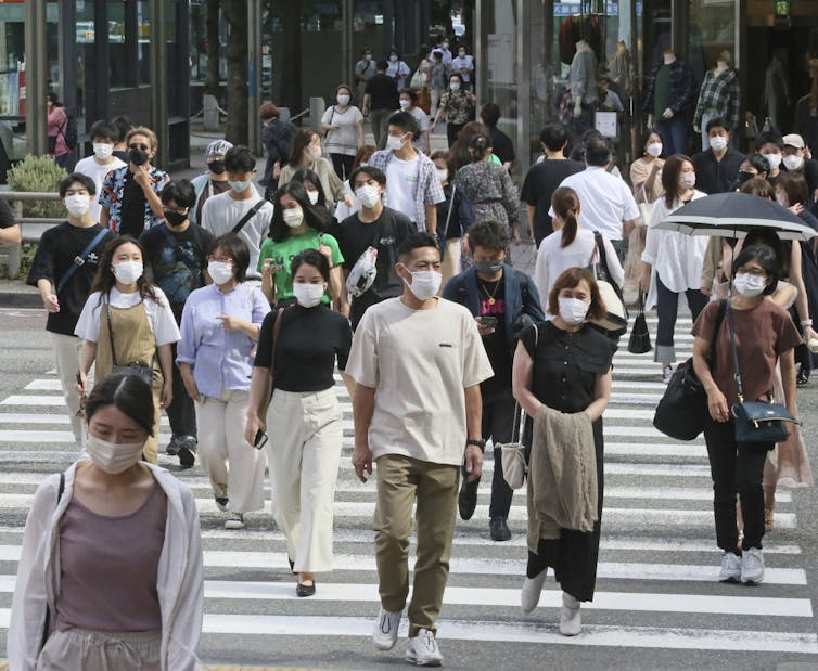 street scene, people in masks