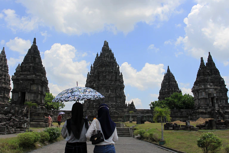 Tourists visit one of the largest Hindu temples in the world, Prambanan Temple in Yogyakarta, Sleman Regency, Indonesia, on Sept. 18, 2021.