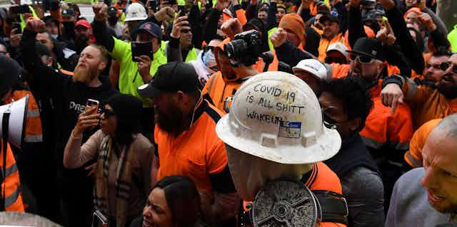 Protesters at the Victorian offices of the Construction, Forestry, Maritime, Mining and Energy Union headquarters on Monday, September 20 2021.