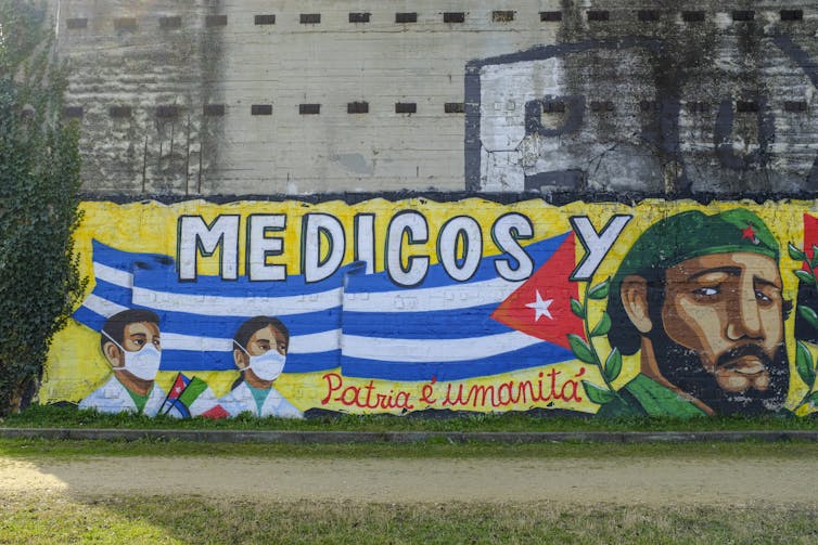 mural on a wall in Italy thanking Cuban doctors