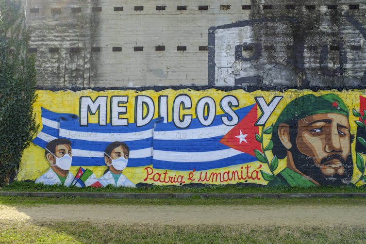 mural on a wall in Italy thanking Cuban doctors