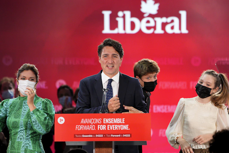 Trudeau speaks from a podium