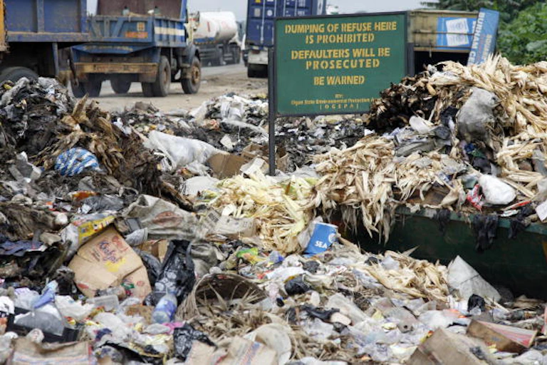 A dump site beside a street.