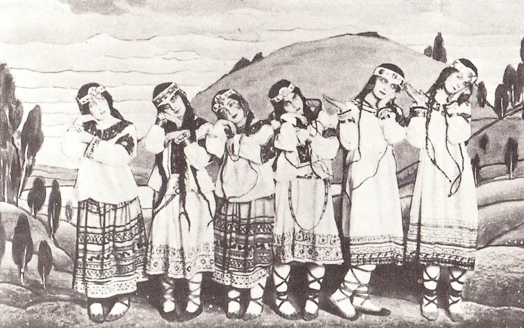 a black and white photograph of dancers