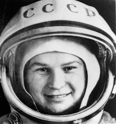 Black and white photo of a woman in a space suit