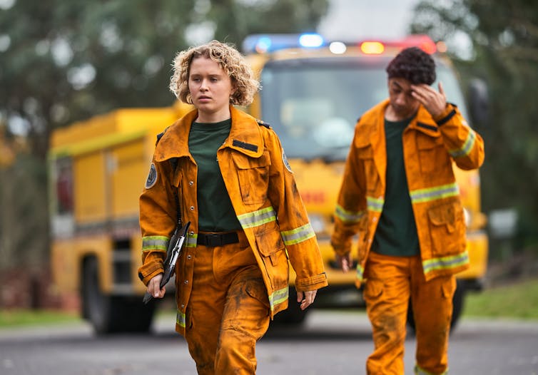 Production still: two firefighters