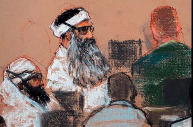 A court drawing depicting Khalid Sheikh Mohammed and co conspirators at a pretrial hearing.