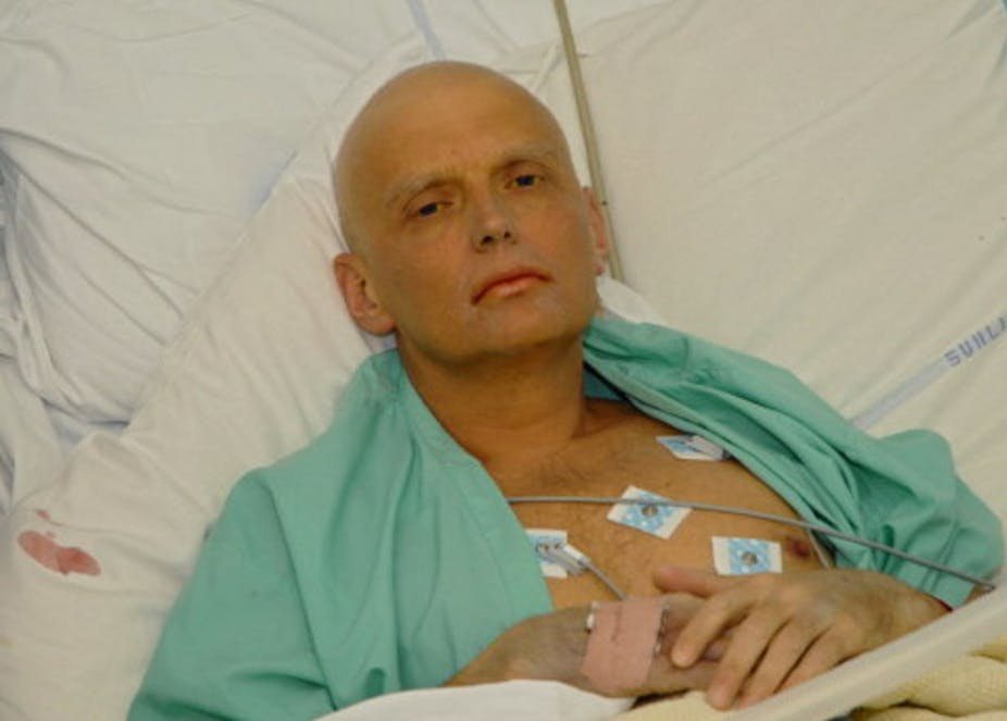 Alexander Litvinenko, a former agent of Russian intelligence, lying in a hospital bed attached to various life support machines.