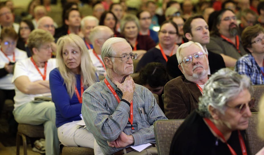 People listen to a talk during the 2014 American Atheists National Convention in Salt Lake City.