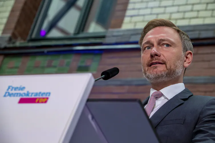FDP leader Christian Lindner giving a press conference.