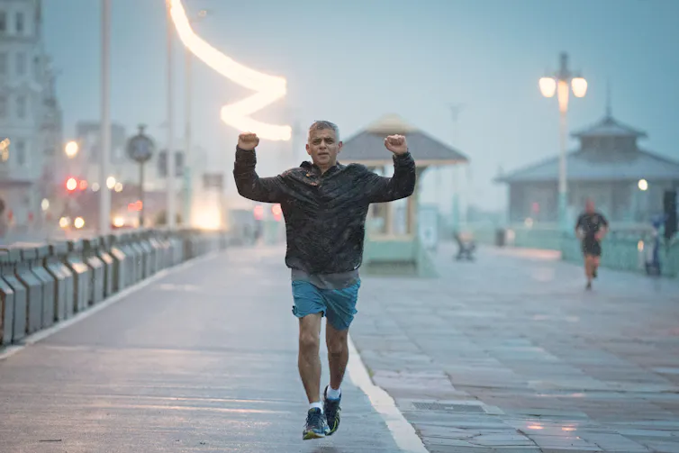 Sadiq Khan out jogging in the rain in Brighton