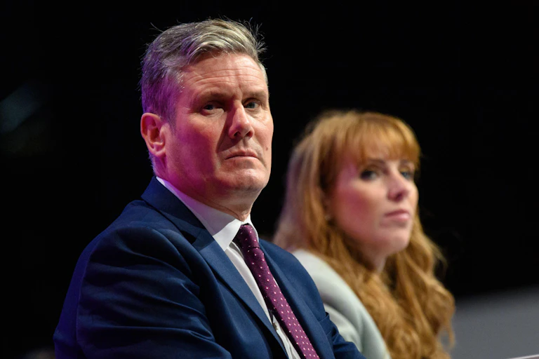 Keir Starmer and Angela Rayner looking serious.