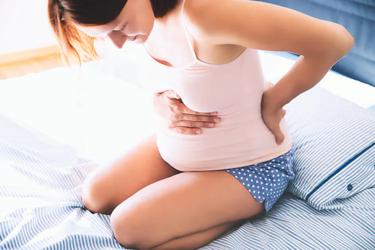 pregnant woman with sore back