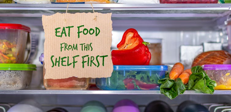 fridge shelf with sign