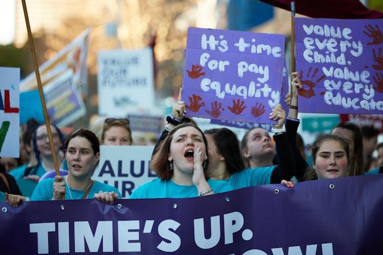 Protesters calling for equal pay.