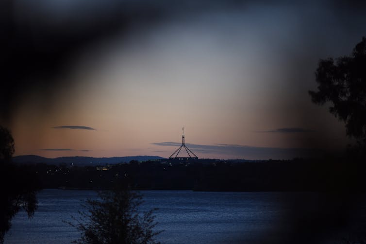 Federal parliament at sunset.