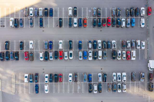 aerial view of cars parked in a car park