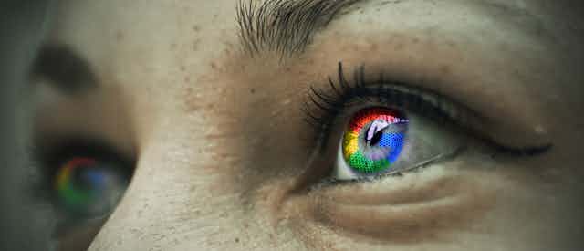 Eyes reflecting Google logo