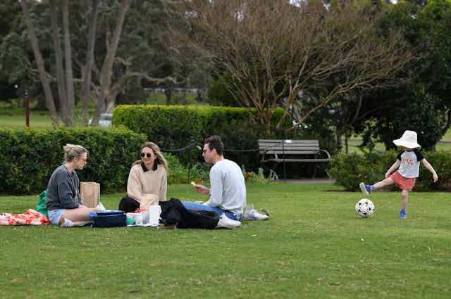 People picnic in a park
