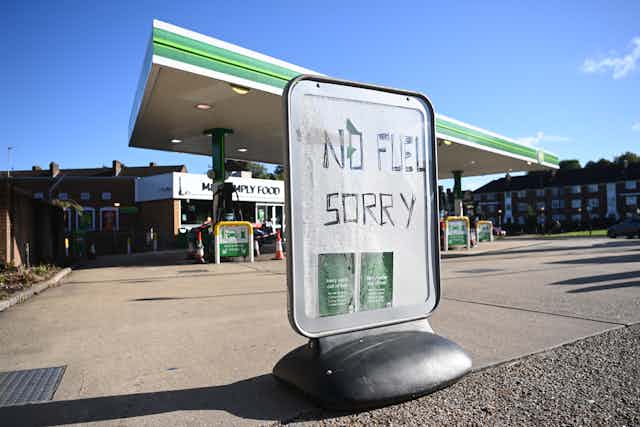 A sign saying 'NO FUEL SORRY'.