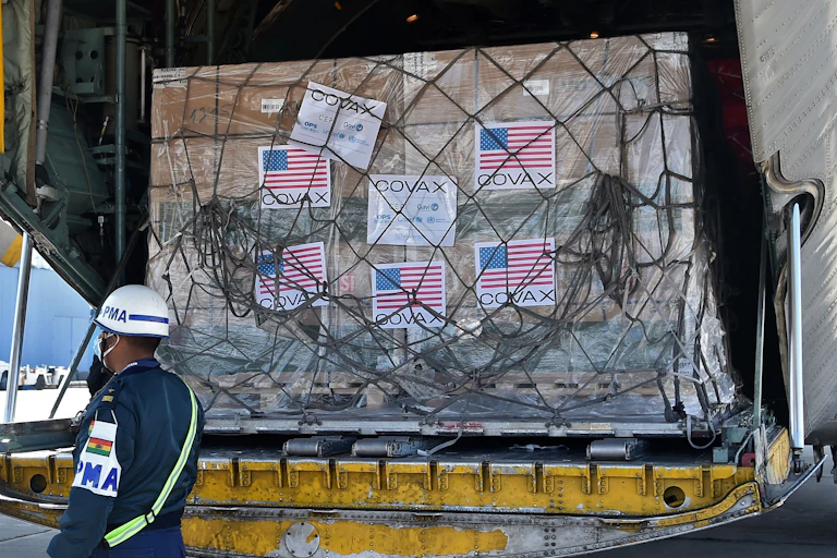 Boxes labeled with US flag in a cargo plane