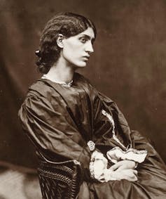 Portrait-style photo of woman in Victorian dress.