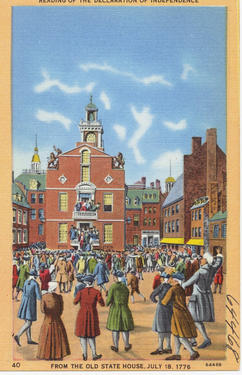 A crowd outside a brick building, with speakers on a balcony