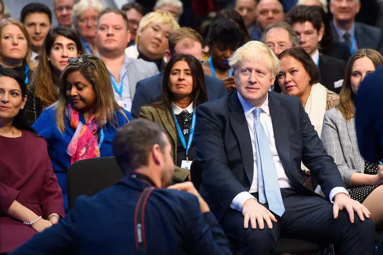 The audience at the Conservative party conference, with Boris Johnson seated on the front row