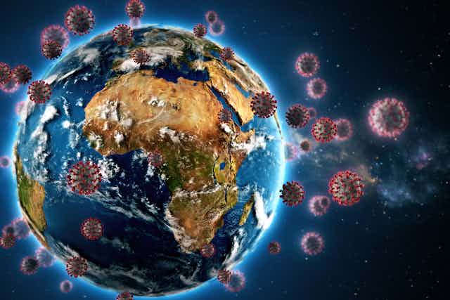 Illustration de la planètet terre avec des coronavirus flottant autour d’elle.