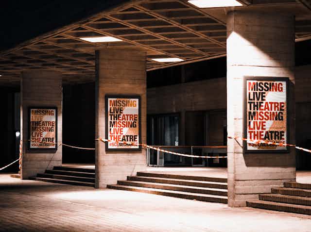 Posters read 'missing live theatre'