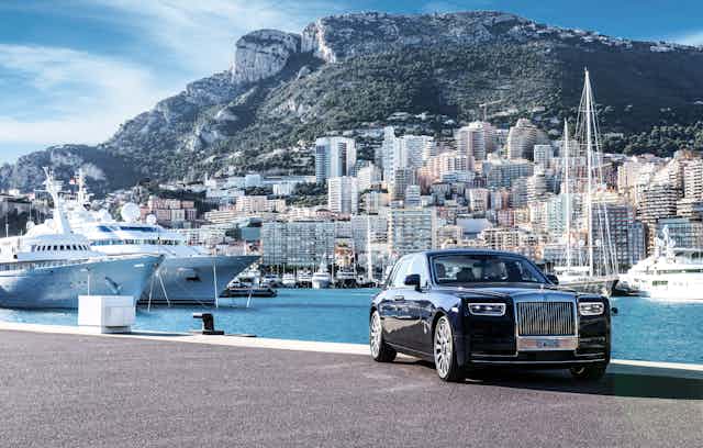 Rolls Royce parked on pier in Monaco.