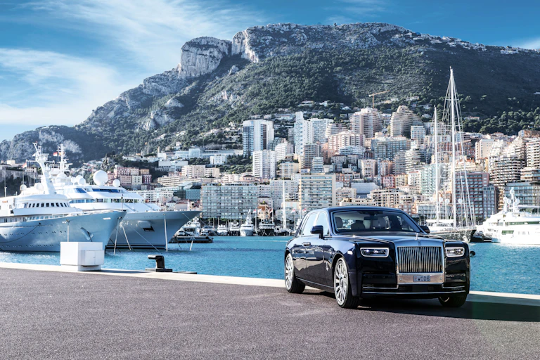 Rolls Royce parked on pier in Monaco.