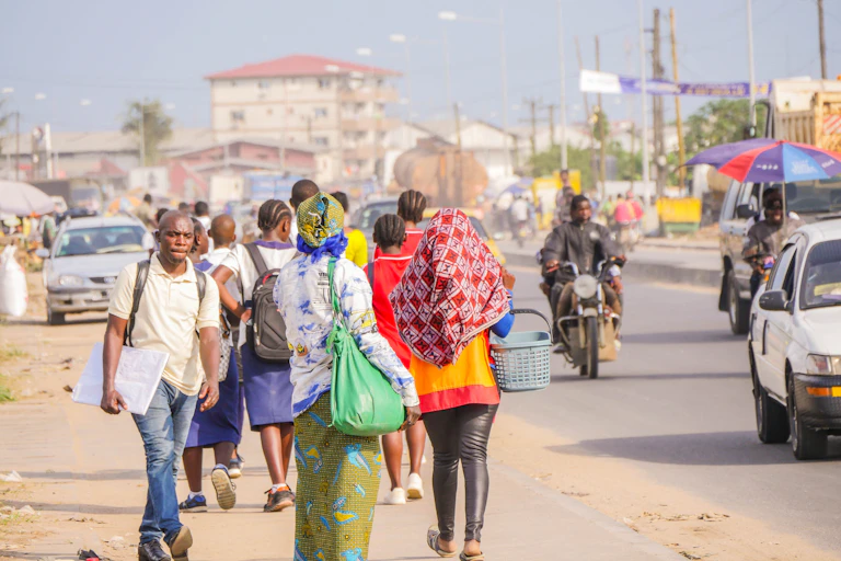 people walking on a busy street