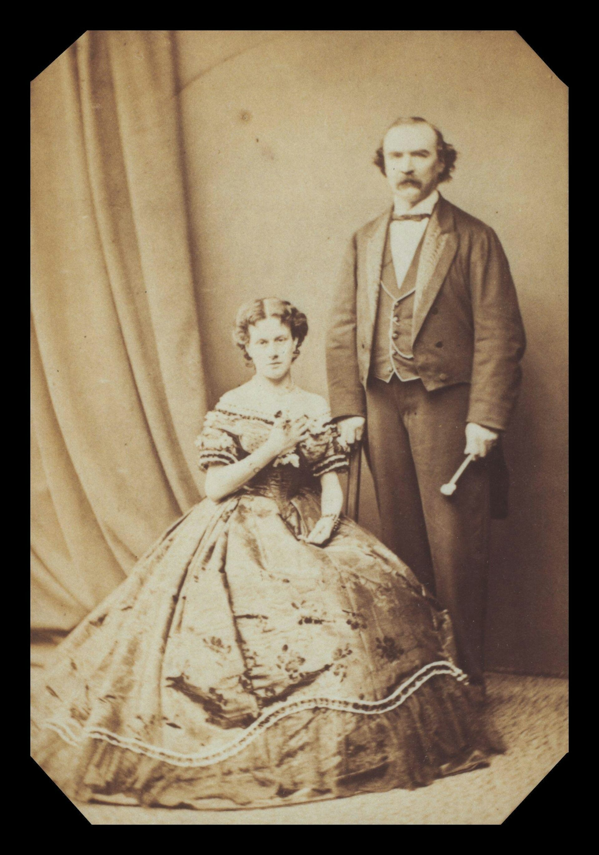 Sepia photograph of a woman and her father.