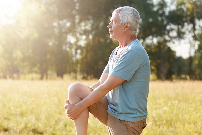 A man standing on one leg