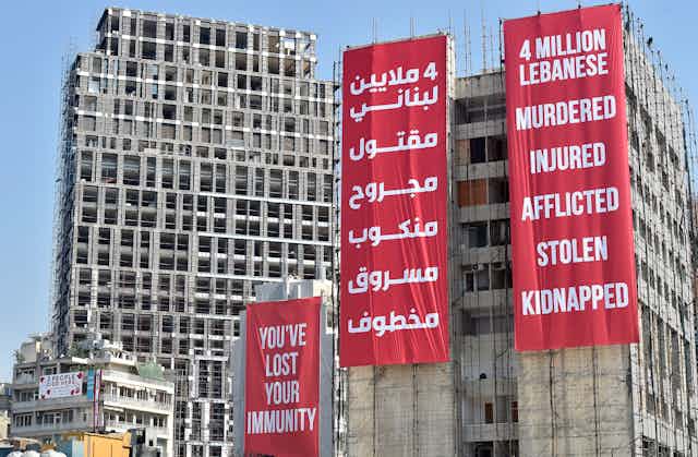 Banners in English and Arabic on the developments being built on the site of the Beirut port which was destroyed in the explosion of August 2020.
