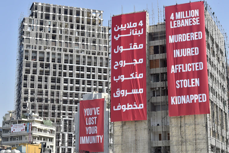 Banners in English and Arabic on the developments being built on the site of the Beirut port which was destroyed in the explosion of August 2020.