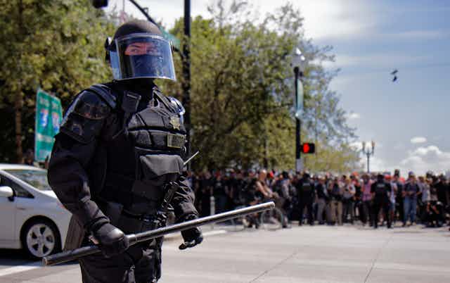 A US police officer in riot gear