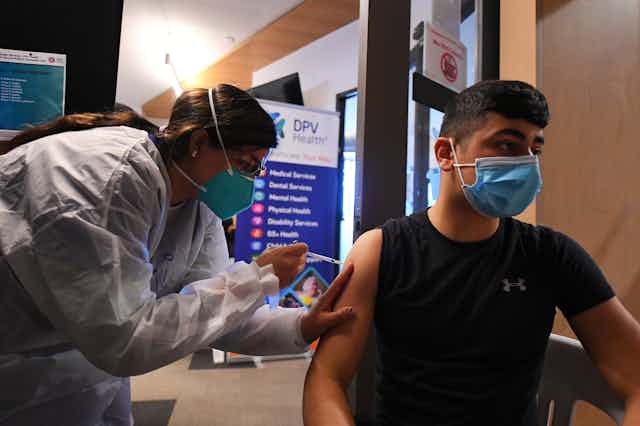 Person getting a COVID-19 vaccine