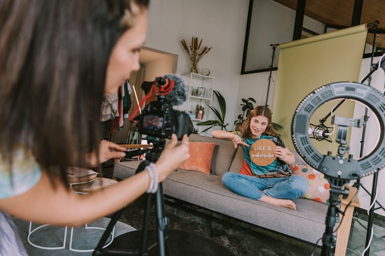 Two young vloggers on a shoot