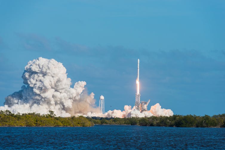 long-distance photo of a rocket launch